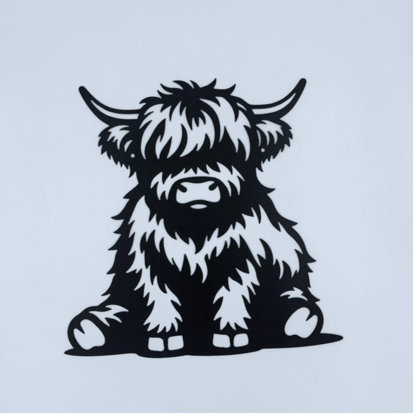 Highland Cow Sitting