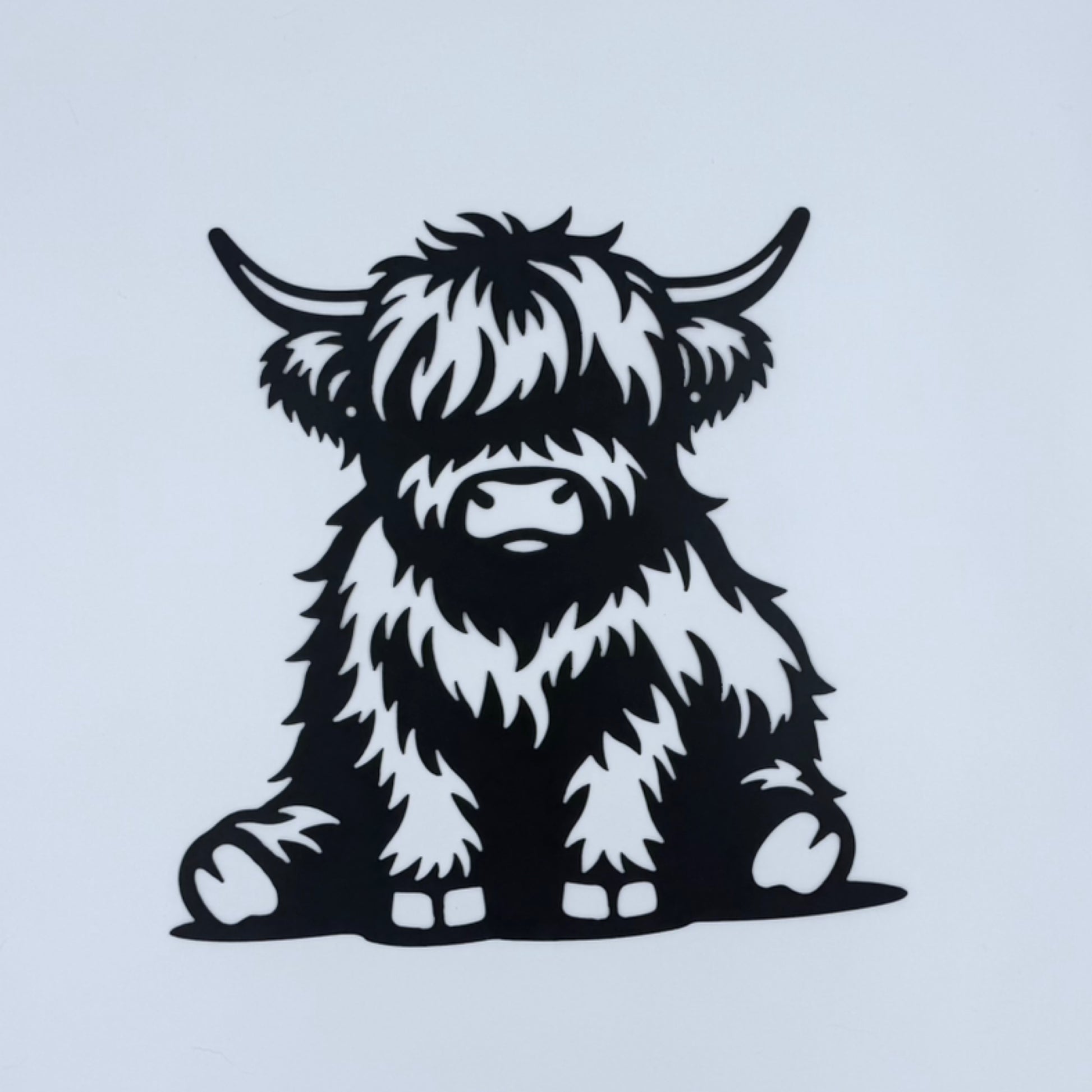 Highland Cow Sitting
